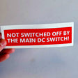 Safety Label Decal | 'Not Switched Off by Main DC Switch' Sticker | Electrical Safety Warning Label | Red Safety Decal Electrician Supplies - Decords